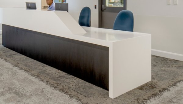 Healthcare vinyl flooring in a clinical environment, showing seamless slip-resistant safety vinyl for aged care wet areas