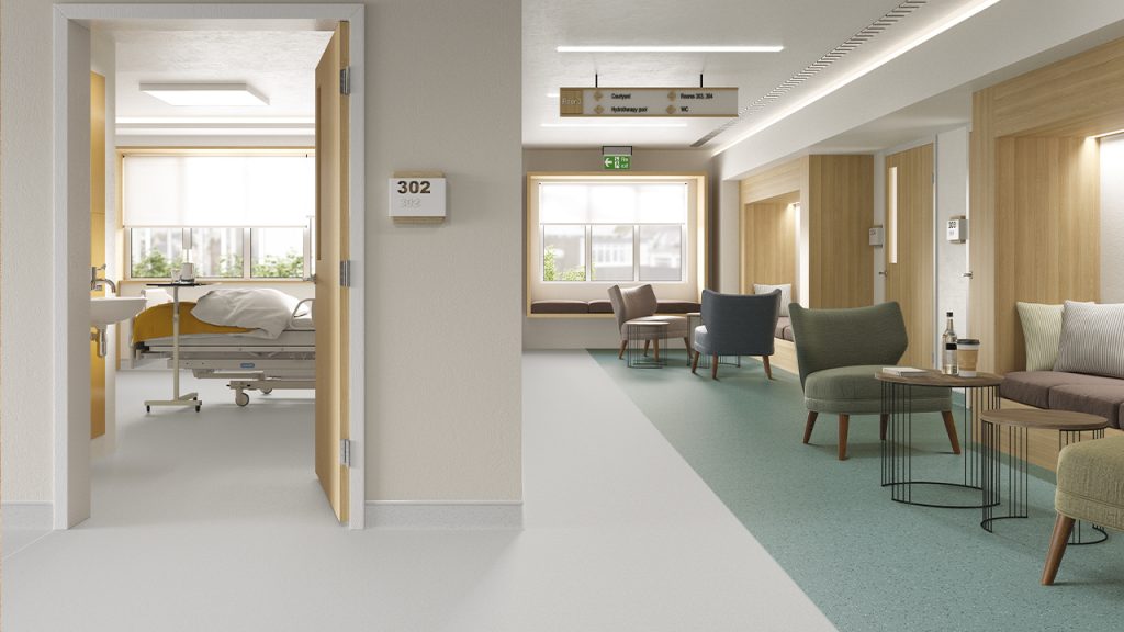 Polyflor Polysafe Verona vinyl flooring installed in a hospital corridor, showing seamless safety surface for high-traffic healthcare areas
