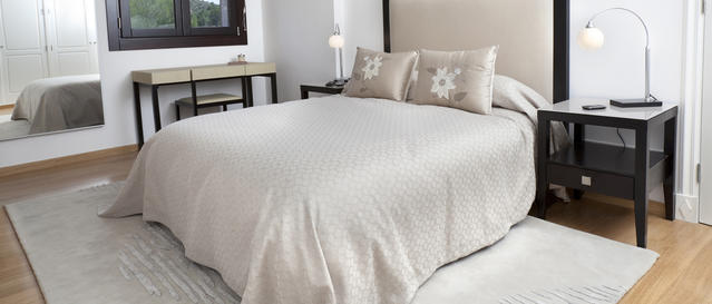 Tarkett vinyl flooring in an aged care bedroom showing warm residential aesthetics with safety performance